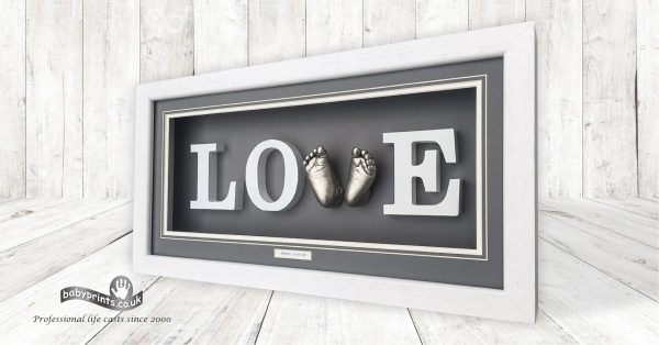 Framed Babyprints keepsake shown on the Northern Ireland profile
