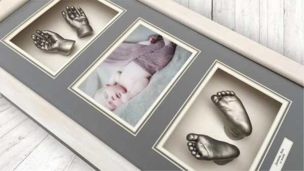 Framed Babyprints keepsake shown on the Northern Ireland profile